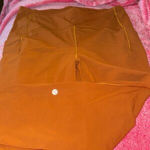 LULULEMON leggings size 12 with pockets and zipper in back